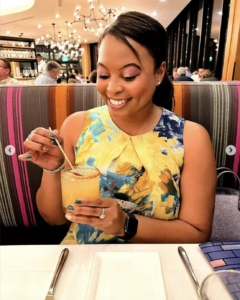 Image of a woman enjoying a cocktail at California Grill