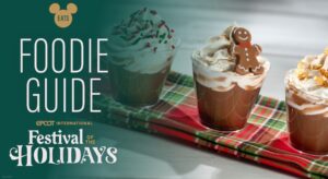 EPCOT International Festival of the Holidays Foodie Guide 2025 Image of hot cocoa with gingerbread cookies