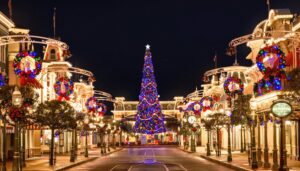 Image of Disney main street with Christmas tree and lights
